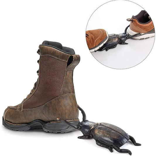 Quitazapatos de metal fundido con forma de escarabajo