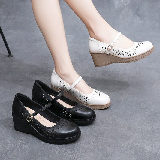 Nuevos zapatos de cuña con punta redonda